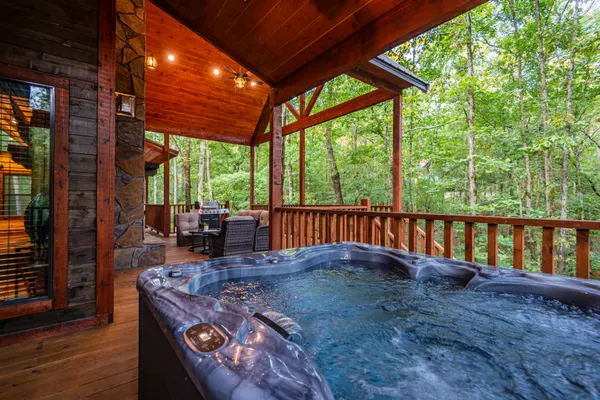 Photo 1 - Rated Top 10 One Bedroom + Oversized Deck + Game Room + Prime Location + Hot Tub