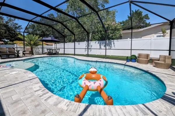 Photo 1 - 3 Bedroom Pool Home, 3 minute drive to Beach!