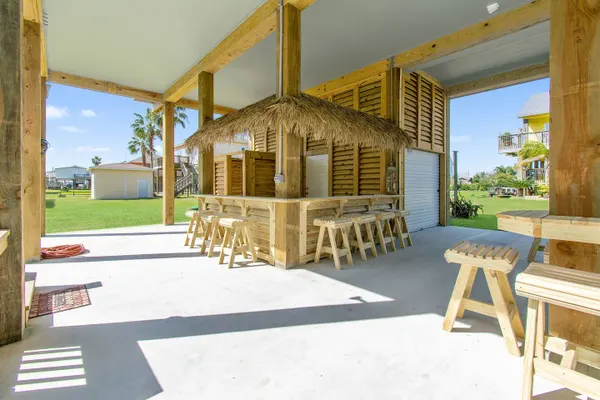Photo 1 - Tiki Bar~King Bed~Arcade~Hot Tub~4min to Beach