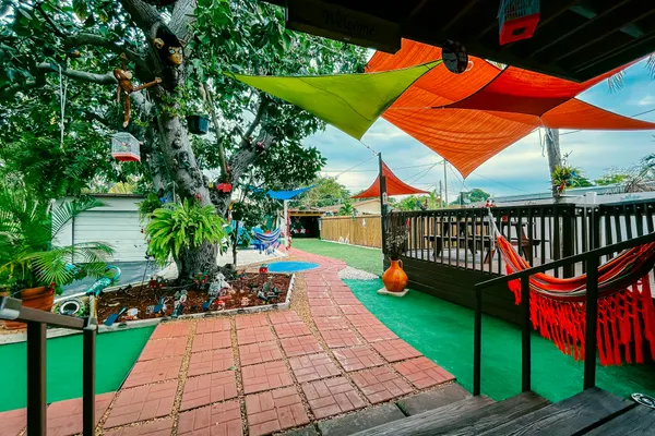 Photo 1 - Hammocks & Mini-Golf! 10 mins from Beach! KING Bed!