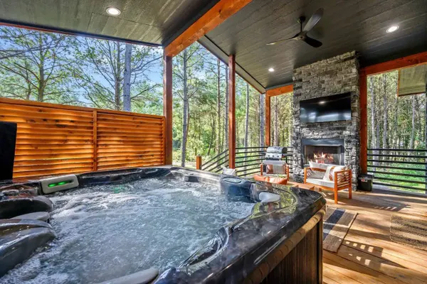 Photo 1 - Romantic Getaway Hot Tub Fireplace Soaking Tub Fire Pit Cabin Broken Bow