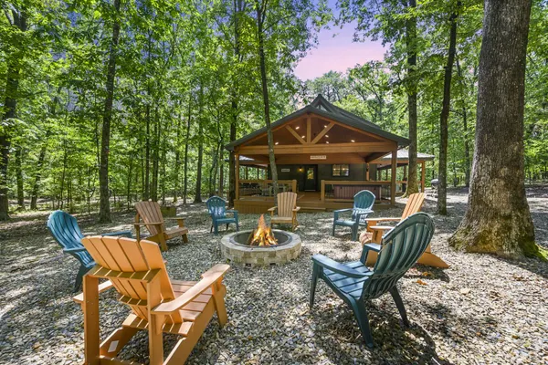 Photo 1 - Private Cabin on 4 acres + Near Attractions + Private Oversized Porch + Hot Tub
