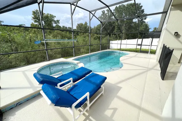 Photo 1 - Family Haven w/Privacy Fence Pool Hot Tub BBQ Game RM - Close to Disney!