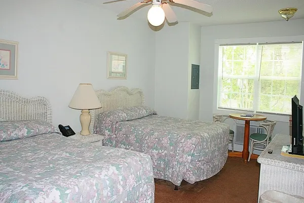 Photo 1 - Brunswick Plantation Studio Unit 604L with Outdoor Pool and 27 Hole Golf Course Onsite