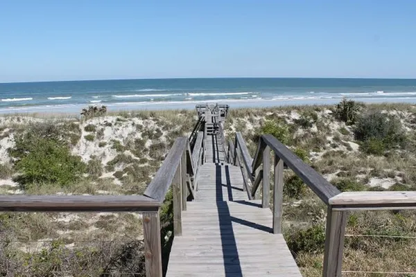 Photo 1 - Ocean front Vacation Home with a large screened-in Patio
