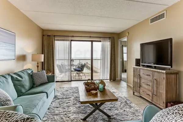 Photo 1 - Comfy Upper Unit Condo to Enjoy the Beach or the Fishing