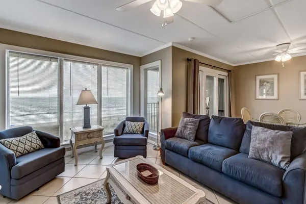 Photo 1 - Coast View Condo Featuring Large Windows Overlooking the Beach