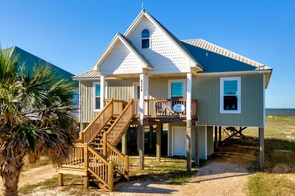 Photo 1 - Tropical Paradise - North side beach beauty!  PET FRIENDLY - Swimming, Kayaking, Boating or Fishing are just steps away!