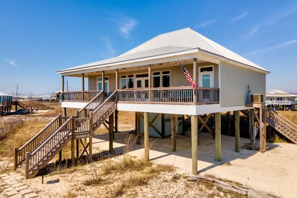 Photo 1 - SeaBatical - Gulf and Bay views - steps to the water - enjoy a family dinner after a great day on the beach!