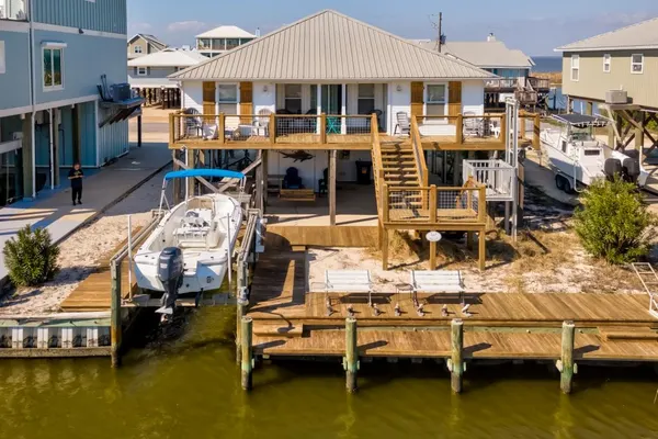 Photo 1 - Waters Edge - PRIVATE DOCK!  Only two blocks from the bay or the gulf!  Plenty of parking for cars or boats