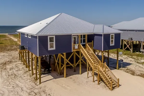 Photo 1 - Blue Oasis - Private backyard beach - pool, hammocks, kayaks, even crab traps so you can catch dinner!