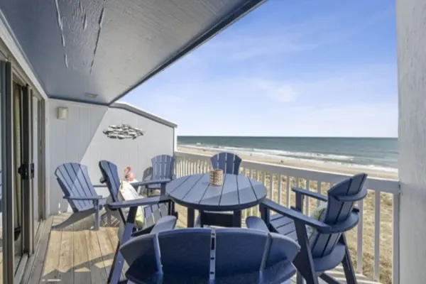 Photo 1 - Conched Out - Feel the ocean breezes as you relax on the deck overlooking the lovely Carolina Beach coastline