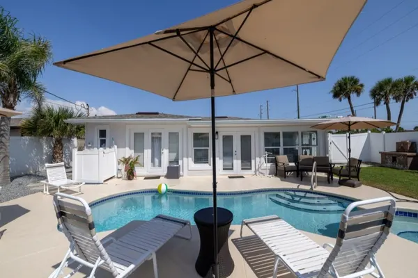 Photo 1 - Heated Pool Home Directly Across the street From Beach Close to Flagler