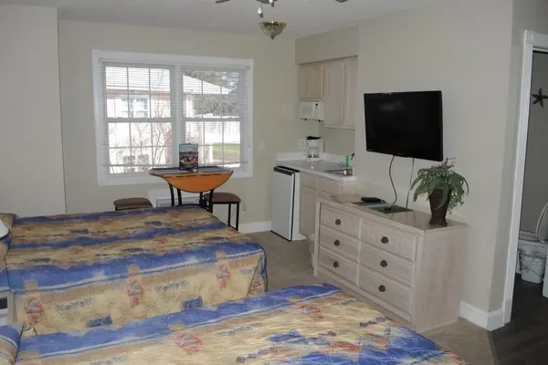 Photo 1 - Brunswick Plantation Studio Home 407L with Onsite Golf Course and Pools