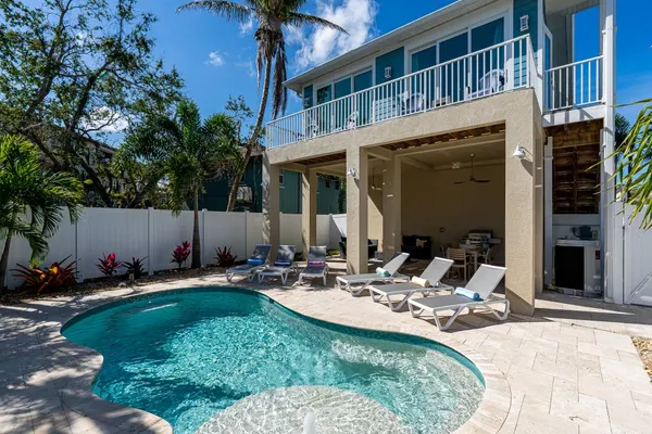 Photo 1 - 5545 New 4BR Oasis: Walk to Beach, Pool, Pet-Friendly!