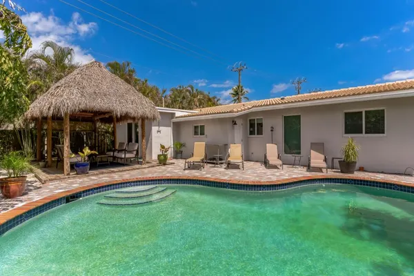 Photo 1 - ISLAND VIBES -  POOL, TIKI HUT, CLOSE TO BEACH, 4 Bed 2 Bath, New, Beautiful and Private!
