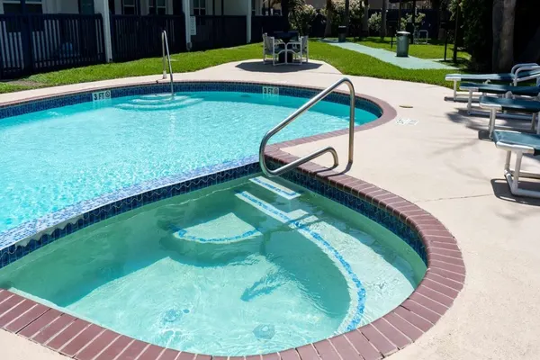 Photo 1 - * Comfy Inside * Updated * Beach 50 yards away