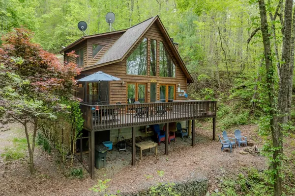 Photo 1 - Lakefront Cabin Bordering Nat Park w/ Hot Tub!