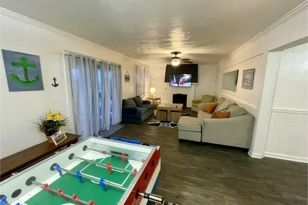 Photo 1 - Roomy Beachfront Apartment with Deck and Game Room