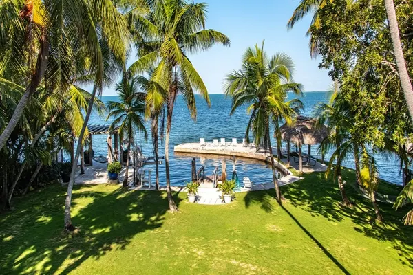 Photo 1 - Lush tropical plantings in a gated compound located directly on the Florida Bay