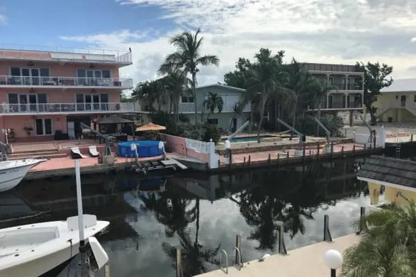 Photo 1 - Beautiful Canal front Home with Above Ground Pool, Dock and Fish Station