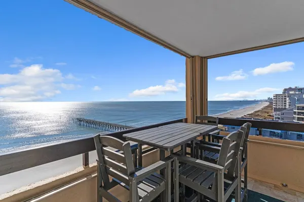 Photo 1 - Coastal Retreat: Beach Access & Modern Comforts