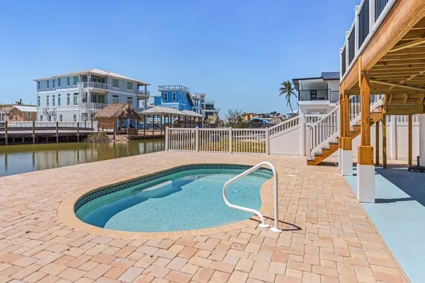 Photo 1 - 920 Bay Breeze Bungalow: Stunning Bay View Home w/ Heated Pool!