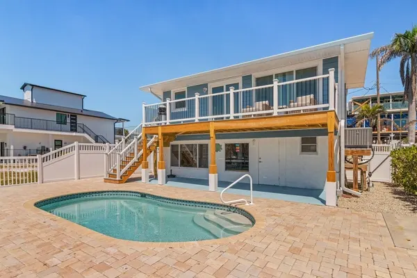 Photo 1 - 920 Bay Breeze Bungalow: Stunning Bay View Home w/ Heated Pool!