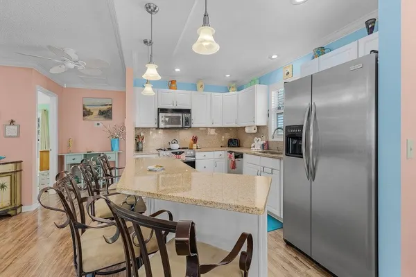 Photo 1 - 140 Barefoot Bungalow: 2BR/2BA/2 Bonus Room Home w/ Heated Pool!