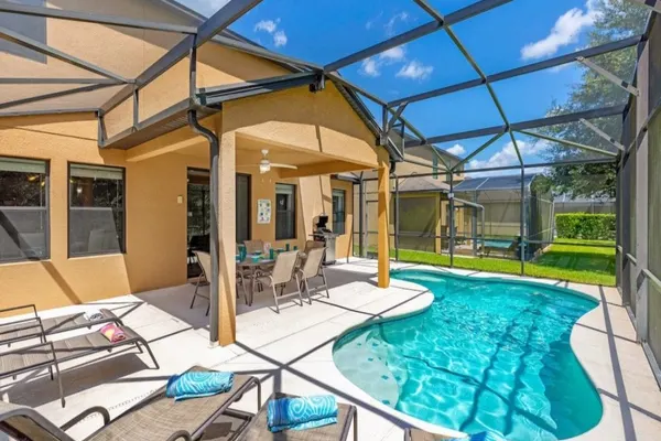 Photo 1 - Luxury 4BR Retreat w/ Pool, Game Room Near Disney