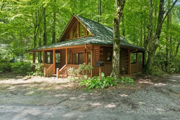 Photo 1 - Cozy Creekside Cabin with Wraparound Porch