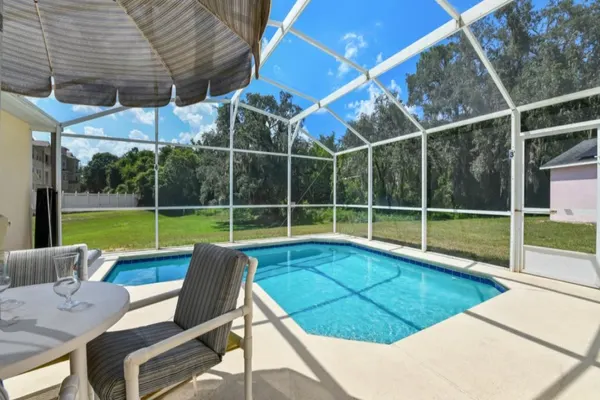 Photo 1 - Reserve Retreat - Gated 4BR with Pool Near Disney