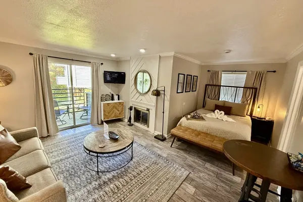 Photo 1 - Smoky Mountain View Escape – Hot Tub • Pool • Fireplace • 10 Min to Downtown