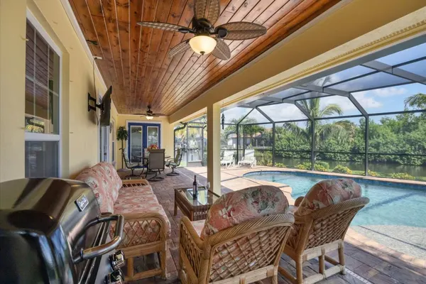 Photo 1 - South Gulf Cove 3 Bedroom Canal Pool Home