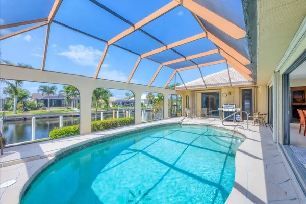 Photo 1 - Punta Gorda Isles 3-Bedroom Canal-front Pool Home with Dock