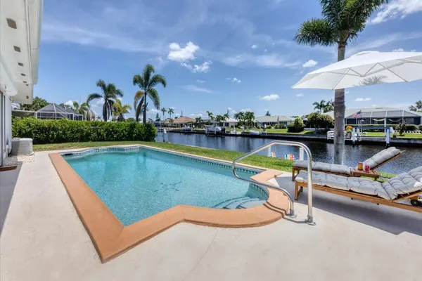 Photo 1 - Punta Gorda Isles 2-Bedroom Private Pool Home on Canal with Dock