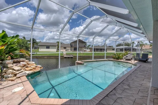 Photo 1 - Cape Coral 3-Bedroom Canalfront Pool Vacation Home with Dock