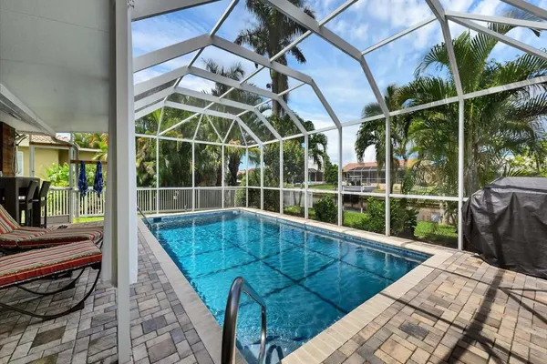 Photo 1 - Punta Gorda Isles 3-Bedroom Private Pool Home on Canal with Dock