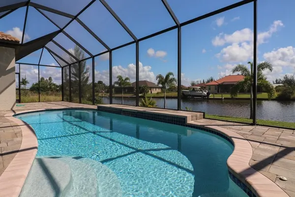 Photo 1 - South Gulf Cove 3 Bedroom Canal Pool Home