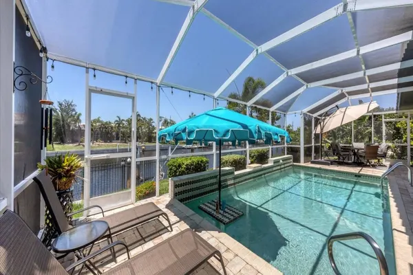 Photo 1 - Family-Friendly Waterfront 4BR Pool Punta Gorda Isles