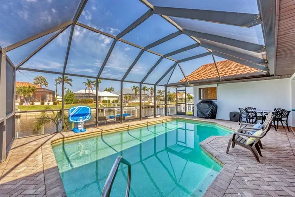 Photo 1 - Punta Gorda Isles 3-Bedroom Canal-front Pool Home with Dock