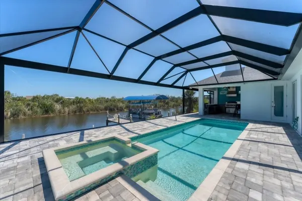 Photo 1 - South Gulf Cove 3 Bedroom Pool + Spa on Canal Private Home