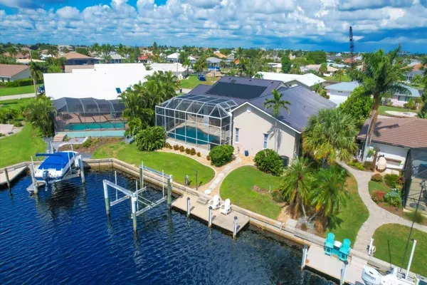 Photo 1 - Punta Gorda Isles 3-Bedroom Private Pool Home on Canal with Dock