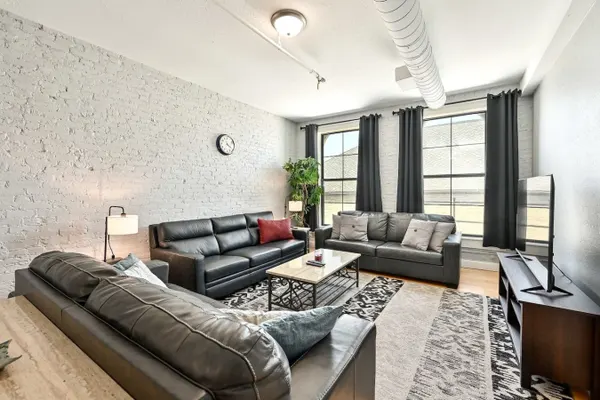 Photo 1 - Luxe 3rd St Condo • Fiserv + Perks & Add-Ons!