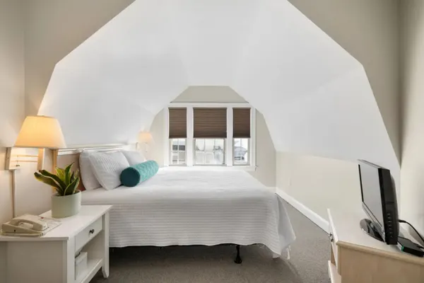 Photo 1 - Private 1-BR w/ King + Queen & Deck | Partial Ocean View (311)