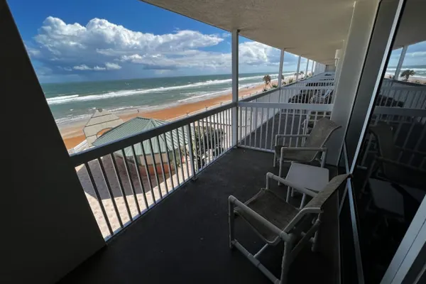 Photo 1 - Coastal Comfort Beachfront On the Ocean Condo