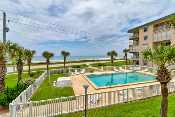 Photo 1 - Oceanfront Sunrise 2 Bed 2 Bath Condo with Pool