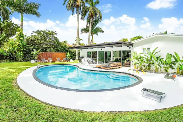 Photo 1 - Tropicana Gem: 3BR Lush Oasis with Pool!