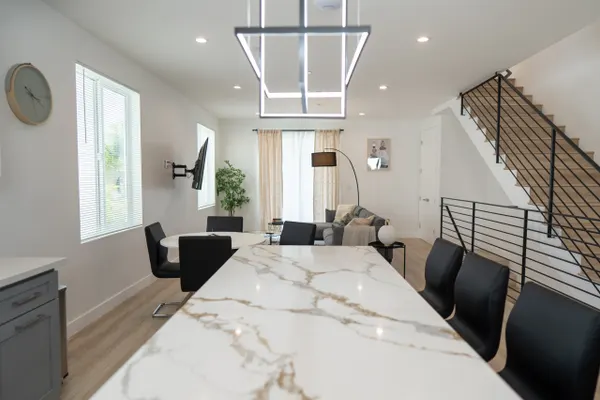 Photo 1 - MODERN 3BR HOME BUILT 2023 w/ GARAGE, FENCED PATIO, 2 BALCONIES & EV-CHARGER p65