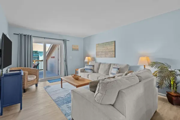 Photo 1 - The Coastal Nest: Steps from the Beach and Poolside Relaxation